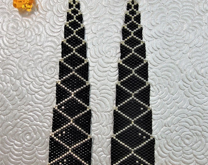 Stunning, Black and Silver colored, long dangle statement earrings for pierced ears by Be Dazzled Earrings perfect for that special occasion
