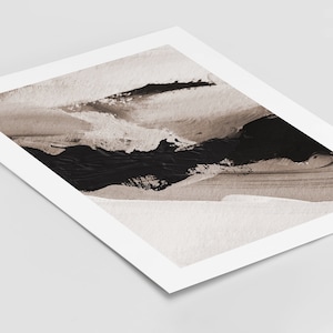 May include: Abstract art print with black and brown paint strokes on a white background.