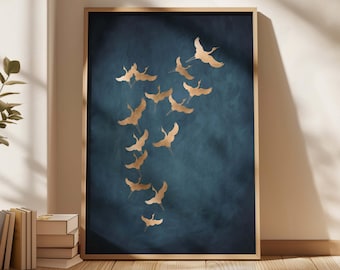 May include: A framed print with a dark blue background and a flock of gold cranes flying in a V formation. The cranes are silhouetted against the blue background.
