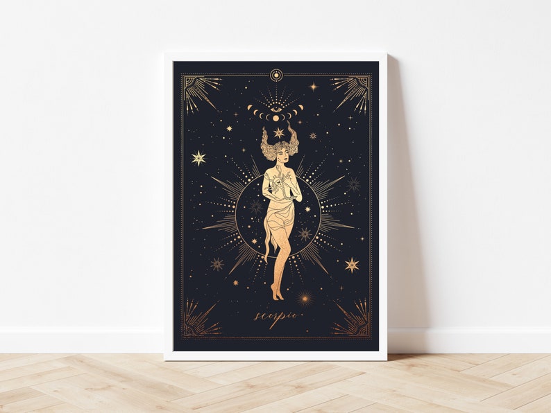 May include: A gold and white illustration of a woman with a crown of stars and a crescent moon above her head. The background is black with stars and the word "Scorpio" is written in gold at the bottom.
