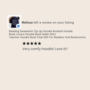 May include: A navy blue hoodie with white text, part of a customer review. The text includes "Reading Sweatshirt," "Bookish Hoodie," and "Book Lovers Hoodie." The review states "Very comfy hoodie! Love it!!"