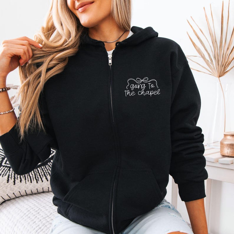 Bridal party getting ready outfit zip up hoodie, going to the chapel with front and back design. Personalized with bride's name and wedding date.