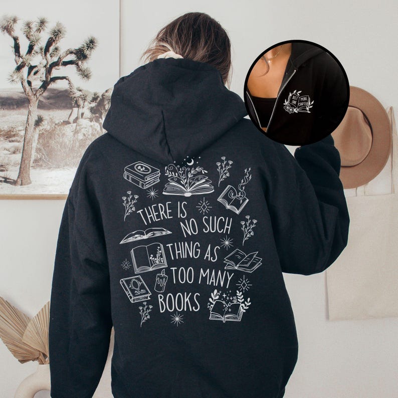 Model wearing bookish zip-up hoodie with book designs on front and back