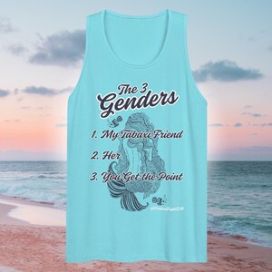 May include: A light blue tank top featuring a mermaid illustration and the text "The 3 Genders 1. My Tabaxi Friend 2. Her 3. You Get the Point" printed on the front.