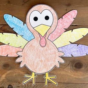 May include: A colorful paper turkey craft with a brown body, yellow legs, and a red wattle. The turkey has a white face with black eyes and a yellow beak. The tail feathers are colored blue, yellow, orange, and purple.