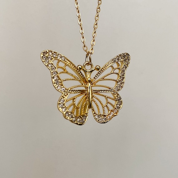 Amazon.com: Across The Puddle, Historical Jewelry Collection, 24k Gold  Plated Pre-Columbian Spirals Butterfly Pendant Necklace : Clothing, Shoes &  Jewelry