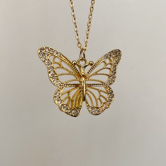 Amazon.com: Across The Puddle, Historical Jewelry Collection, 24k Gold  Plated Pre-Columbian Spirals Butterfly Pendant Necklace : Clothing, Shoes &  Jewelry