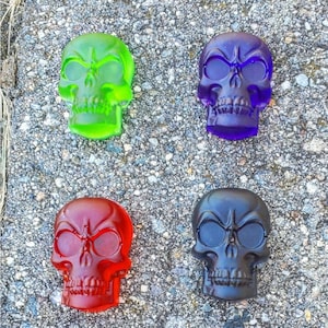 Set of Four Mini Resin Skulls