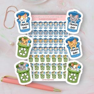 May include: A sheet of planner stickers featuring cute cartoon cats in blue and green trash cans. The stickers say "Trash Day" and "Recycling".