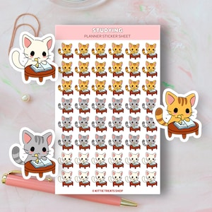 May include: A sheet of planner stickers featuring adorable cartoon cats studying at a desk. The stickers come in three color variations: white, gray, and orange. The sheet includes the text "Studying Planner Sticker Sheet" and "Kittie Treats Shop".