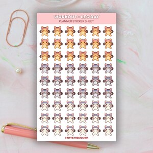 May include: A planner sticker sheet with multiple cat illustrations lifting weights. The cats are in various colors, including orange, yellow, and gray. The text "WORKOUT - LEG DAY PLANNER STICKER SHEET" is at the top. The Kittie Treats Shop logo is at the bottom.