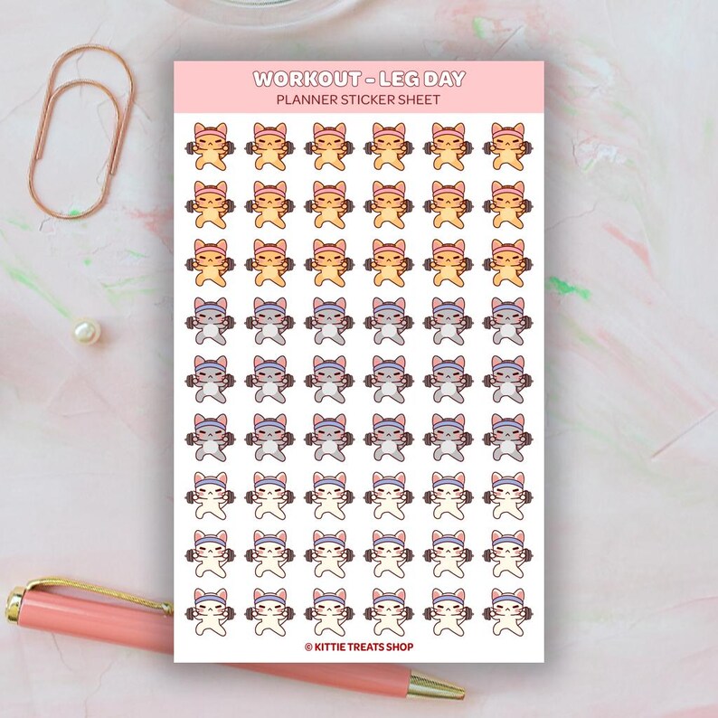 May include: A planner sticker sheet with multiple cat illustrations lifting weights. The cats are in various colors, including orange, yellow, and gray. The text "WORKOUT - LEG DAY PLANNER STICKER SHEET" is at the top. The Kittie Treats Shop logo is at the bottom.