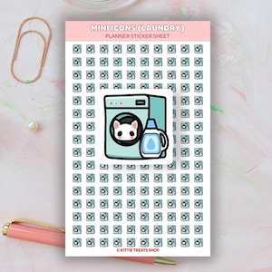 May include: A planner sticker sheet with a pink background featuring laundry-themed mini icons. The sheet includes a large teal washing machine with a cat face and a detergent bottle. The text "MINI ICONS (LAUNDRY)" and "PLANNER STICKER SHEET" are at the top.
