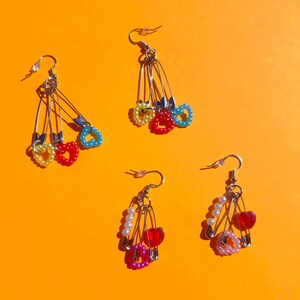 triple safety pin pearl heart bead earrings