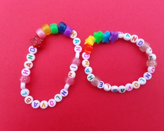hand in unlovable hand bracelet