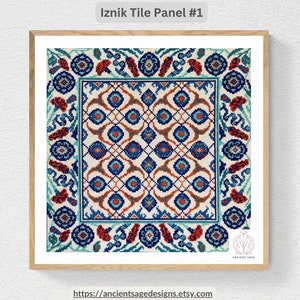 May include: A framed cross-stitch pattern of a traditional Iznik tile design. The tile features a geometric pattern in shades of blue, red, and white. The frame is made of wood and has a light brown finish. The title "Iznik Tile Panel #1" is displayed above the image.