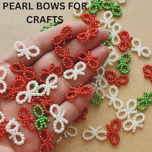 Christmas Bow Embellishment Small Pearl Accessory Craft Supply Holiday Decoration Piece Handmade Tiny Festive Accent Scrapbook Card Making Project Red Green White Colors Plastic Mini Bows Perfect Size One Centimeter Height Holiday Crafting