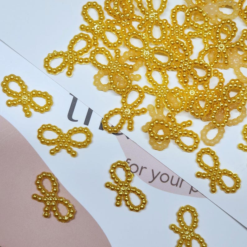 Tiny Yellow Beaded Bow for Summer Craft Projects, Bright Scrapbook Embellishment, Joyful Handmade Card Accent, Mini Plastic Bow for Jewelry, Journals, and Birthday Gift Wrapping, Cheerful DIY Supply