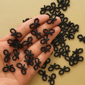 Mini Black Beaded Bow Accent for Jewelry Making and Gothic Crafts, Elegant Scrapbook Embellishment, Chic Handmade Bag Decor, Modern Cardmaking Supply, Small Plastic Bow for Fashion Accessories and DIY Projects