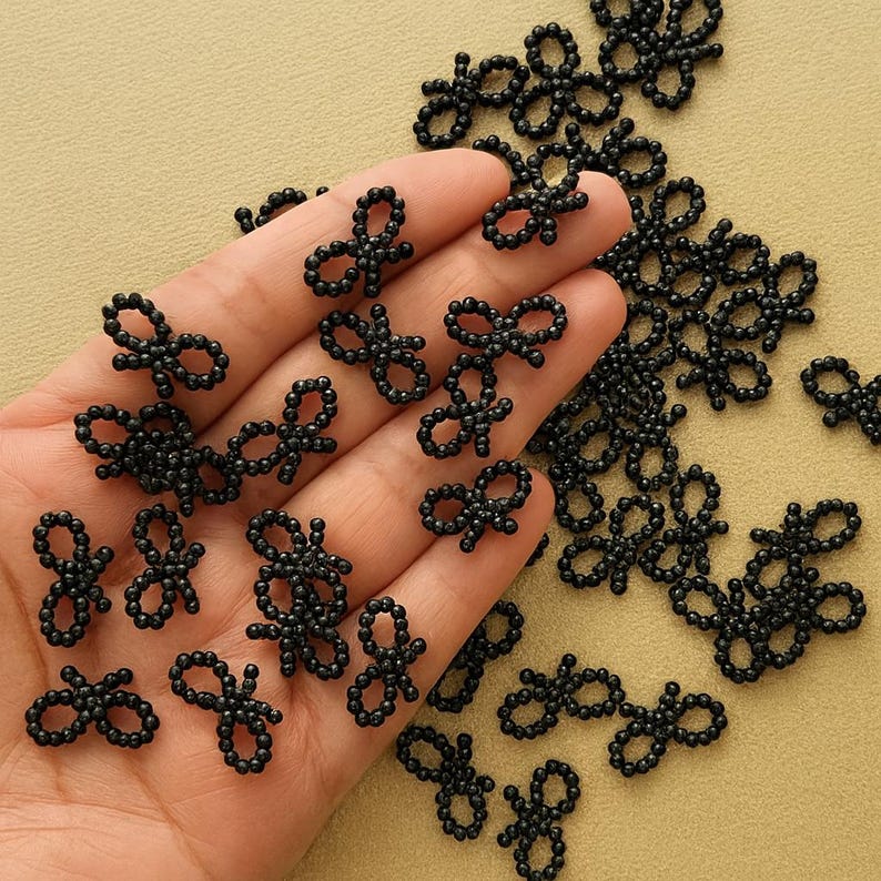 Mini Black Beaded Bow Accent for Jewelry Making and Gothic Crafts, Elegant Scrapbook Embellishment, Chic Handmade Bag Decor, Modern Cardmaking Supply, Small Plastic Bow for Fashion Accessories and DIY Projects