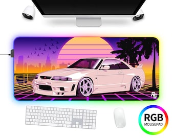 May include: A white car with a sunset and palm trees in the background. The car is on a neon pink and blue grid. The mousepad has a rainbow border and the text "RGB Mousepad".