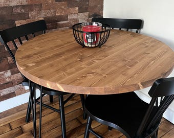 Round wooden table, Blenom round dining table, kitchen or living room. Cuzco model. Black hairpin legs.