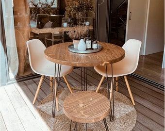 Cuzco Blenom round wooden table, natural, rustic solid. Dining, kitchen or living room table. Black hairpin legs. Sustainable.