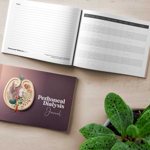 May include: A journal titled "Peritoneal Dialysis Journal" with a floral design on the cover. The journal is open to show lined pages and a chart. A small potted plant is in the foreground.