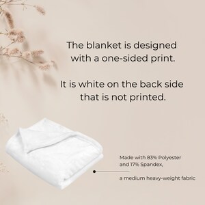 May include: White blanket folded on a light brown background. The blanket is made with 83% polyester and 17% spandex, and is a medium heavy-weight fabric. The text on the image reads: "The blanket is designed with a one-sided print. It is white on the back side that is not printed."