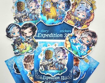 May include: A collection of colorful stickers featuring anime-style characters. The stickers have a variety of designs, including couples, characters with armor, and characters with a campfire. The text "o' diary stickers Expedition 33" is visible.