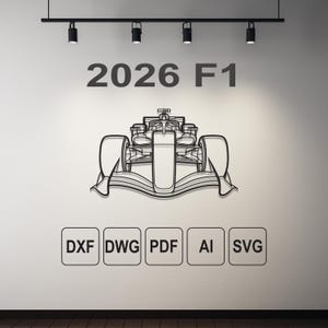 May include: A black metal wall art piece depicting a Formula 1 race car. The text "2026 F1" is above the car, and below are file format icons: DXF, DWG, PDF, AI, and SVG. The art is mounted on a white wall.