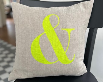 Beautiful natural linen cushion cover with neon yellow ampersand
