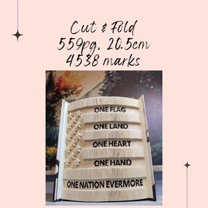 May include: A book art project with the words "ONE FLAG, ONE LAND, ONE HEART, ONE HAND, ONE NATION EVERMORE" folded into the pages. The book is 559 pages and 20.5 cm long. It has 4538 marks.