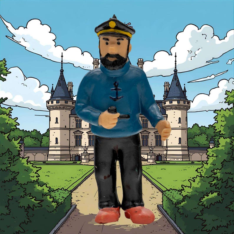 May include: A figurine of a cartoon character in a blue sweater with an anchor emblem, black pants, and red shoes. The character is holding a pipe and wearing a black hat with a yellow emblem. The background features a castle and a blue sky with clouds.