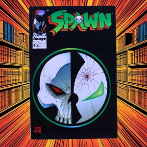 Könnte beinhalten: Ein Comicbuch mit dem Titel Spawn Ausgabe Nummer 6 mit einem schwarzen Einband und einer großen kreisförmigen Grafik. Die Grafik zeigt ein weißes Totenkopfgesicht auf der linken Seite und eine rissige weiße Fläche mit einem grünen Element auf der rechten Seite.