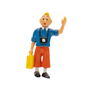 May include: A white ceramic mug with a black handle and the text "But First, Coffee" in a black, bold font. The mug is on a white surface.