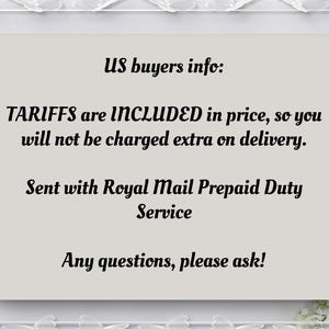 May include: A light beige card with black text that reads "US buyers info: TARIFFS are INCLUDED in price, so you will not be charged extra on delivery. Sent with Royal Mail Prepaid Duty Service. Any questions, please ask!"