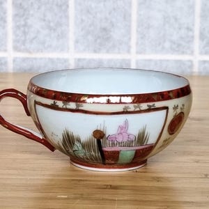 Vintage Japanese Teacup Porcelain, Hand Painted Kutani Style Cup, Meiji Era Figure Landscape Decoration, Red Gold Accent Export Japan 50s