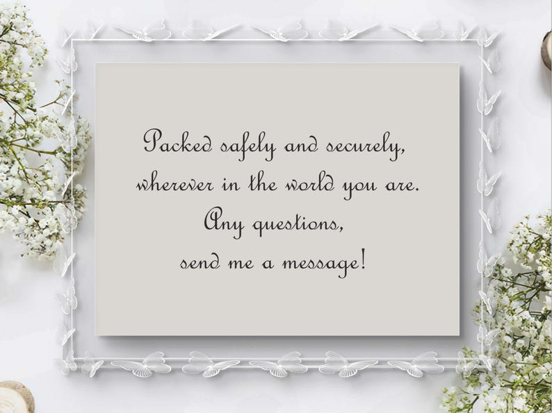 May include: A rectangular card with text in a decorative frame. The text reads: "Packed safely and securely, wherever in the world you are. Any questions, send me a message!" The frame is white with butterfly accents.