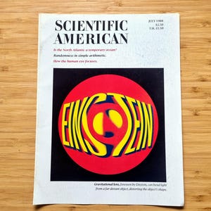 May include: The July 1988 issue of Scientific American magazine features a cover with the title in black text. A central graphic shows the word EINSTEIN in yellow letters against a red circle. Subtitles include North Atlantic, arithmetic, and eye focus.