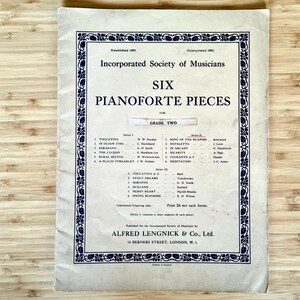 Libro de música vintage, colección de pianos antiguos, antología de partituras educativas, edición de práctica clásica, regalo para pianistas de principios del siglo XX.