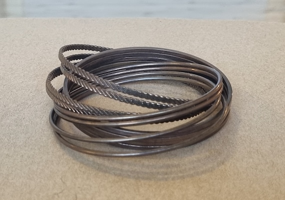 Bronzed Metal Bracelets | Interlocking Bangle Set… - image 1