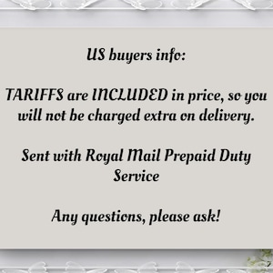May include: A light beige card with black text that reads "US buyers info: TARIFFS are INCLUDED in price, so you will not be charged extra on delivery. Sent with Royal Mail Prepaid Duty Service. Any questions, please ask!"