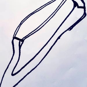 May include: A black and white line drawing of a stylized object, possibly a container or a tool. The object has a curved shape with two parallel lines running along its length, and a small rectangular detail near the top.
