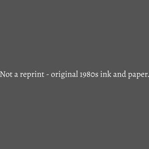 May include: Dark gray background with the text "Not a reprint - original 1980s ink and paper." in white. The text suggests a vintage or retro item, possibly a print or document from the 1980s.