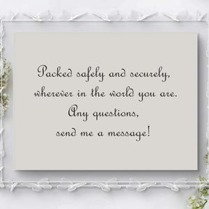 May include: A rectangular card with text in a decorative frame. The text reads: "Packed safely and securely, wherever in the world you are. Any questions, send me a message!" The frame is white with butterfly accents.