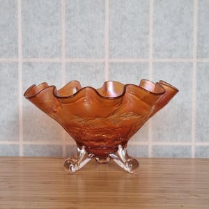 Marigold Carnival Glass Ruffled Bowl | Vintage Ruffled Edge Three Leg | Orange Iridescent Floral Pattern Art Deco Display Centerpiece 1960s