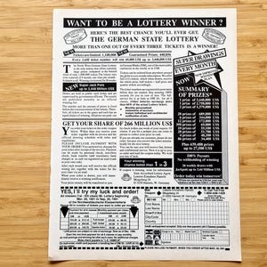 May include: A black and white advert for the German State Lottery, with text and a prize summary. The ad offers a chance to win and includes an order form. The background is a wooden surface.