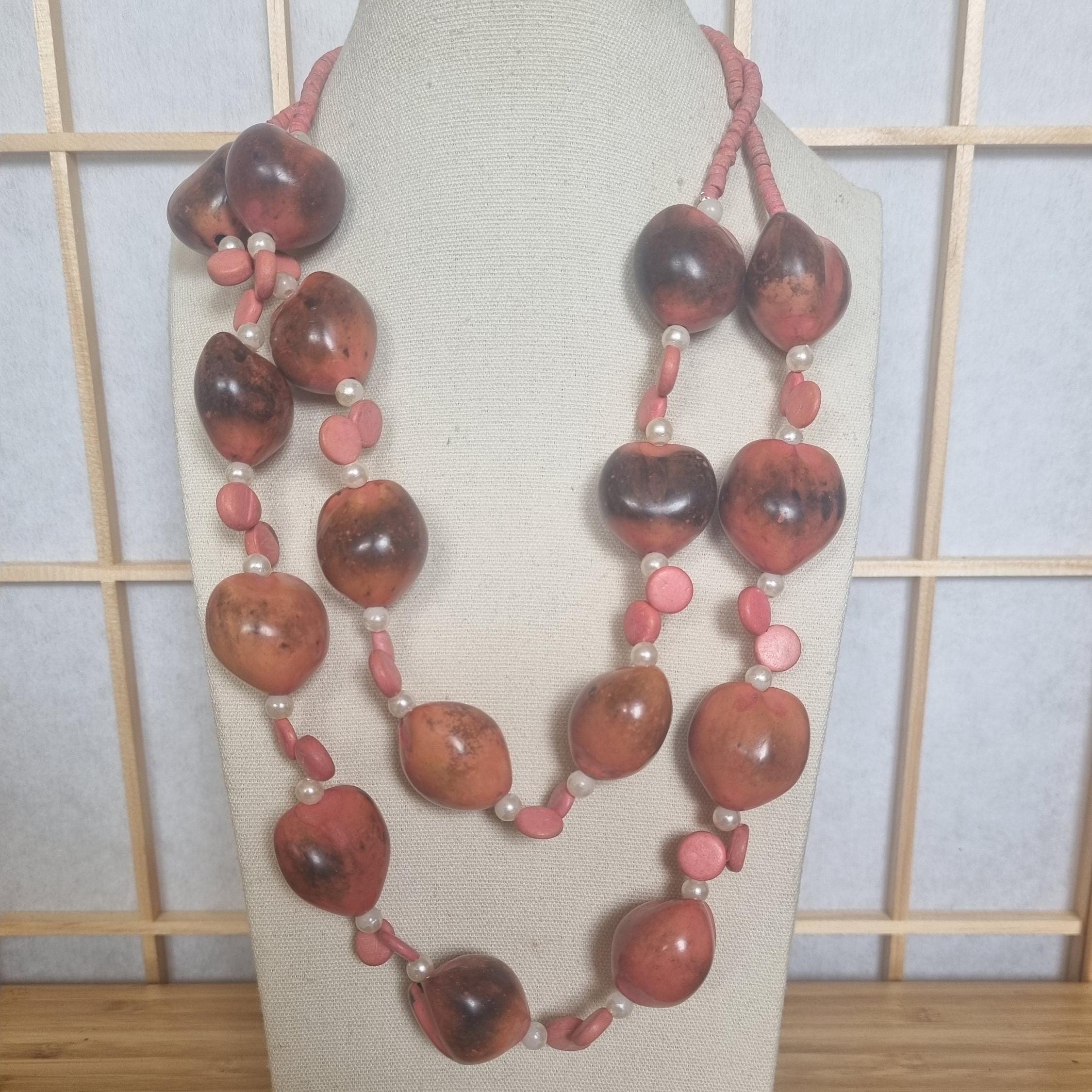 タグアナッツの二連ネックレス｜ピンクの天然シードジュエリー｜手作り 