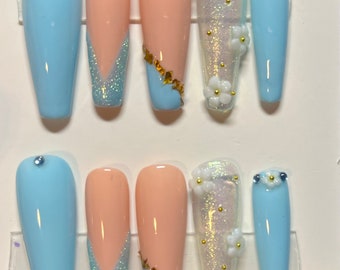 Blue nails with 3d flowers